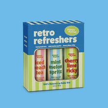 Load image into Gallery viewer, Packaging of retro refreshers lip balm trio with colorful labels on a blue background