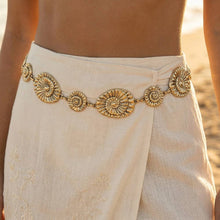 Load image into Gallery viewer, Beige skirt with decorative gold belt against a blurred natural background