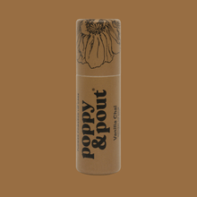 Load image into Gallery viewer, Brown Vanilla Chia Poppy & Pout Lip Balm on a light brown background