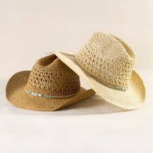 Load image into Gallery viewer, Two cowboy hats stacked, one khaki one ivory with beaded hat bands and a white background